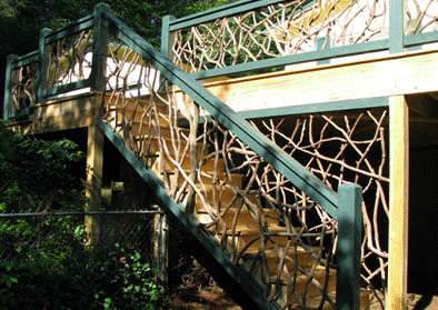 rustic wood staircase dappled with shadows