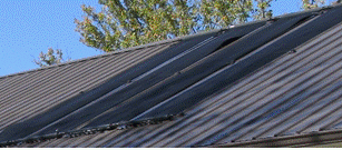 4 solar hot water panels installed on a green home