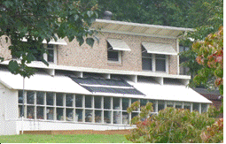 2 solar hot water panels installed on a passive solar home